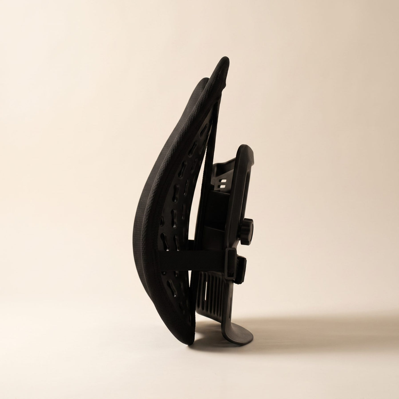 Side profile of the Uprite lumbar support showing its depth