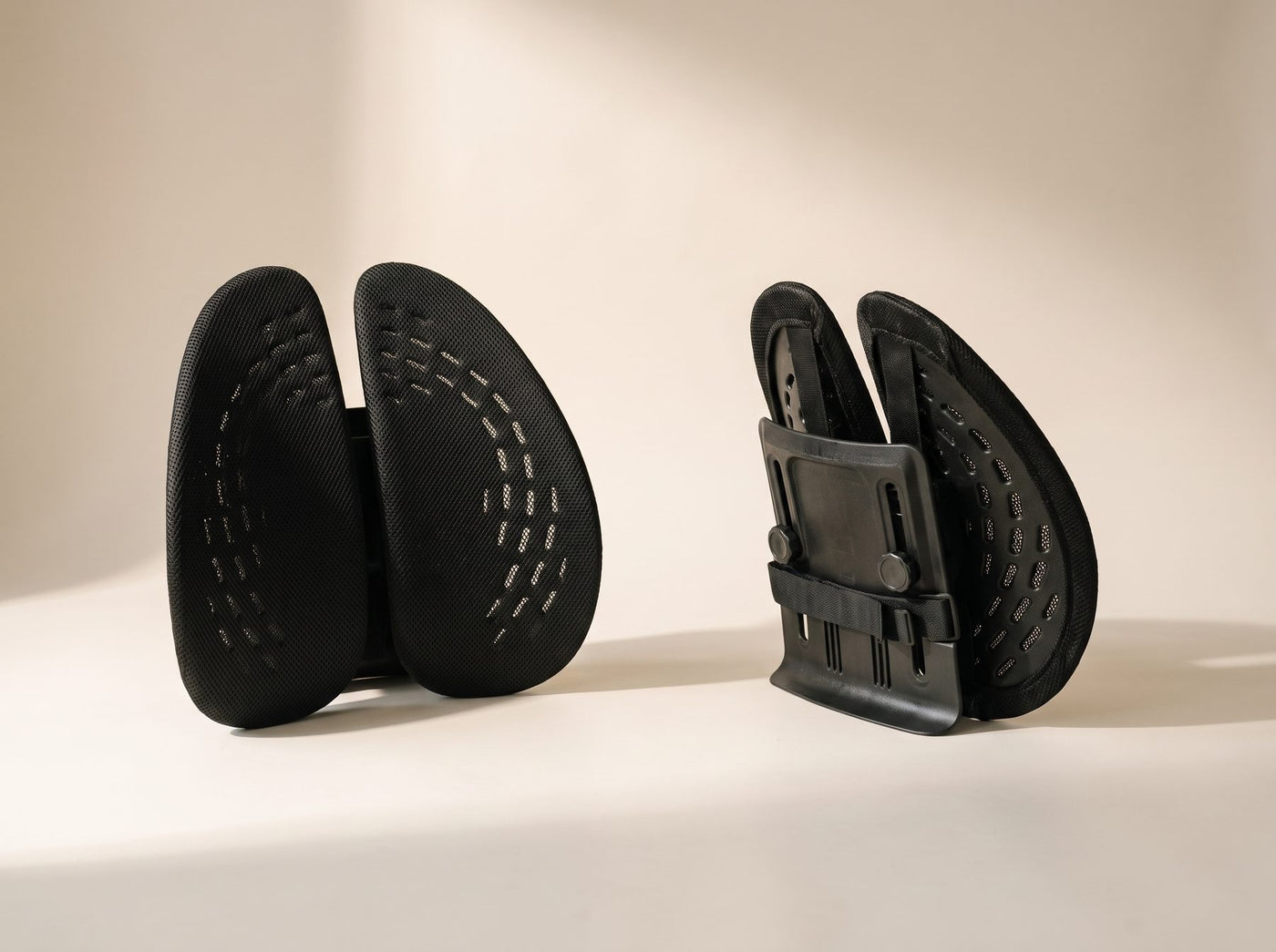 Two Uprite lumbar supports, front and back